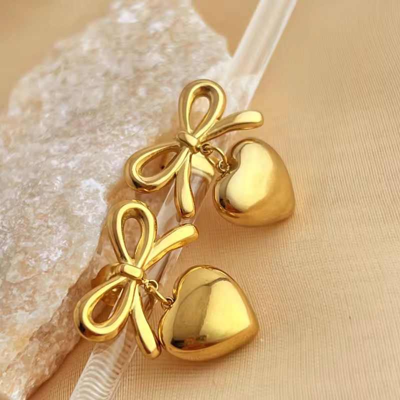 Gold Bow Drop Earrings with Dangling Heart Charm – Cute & Chic