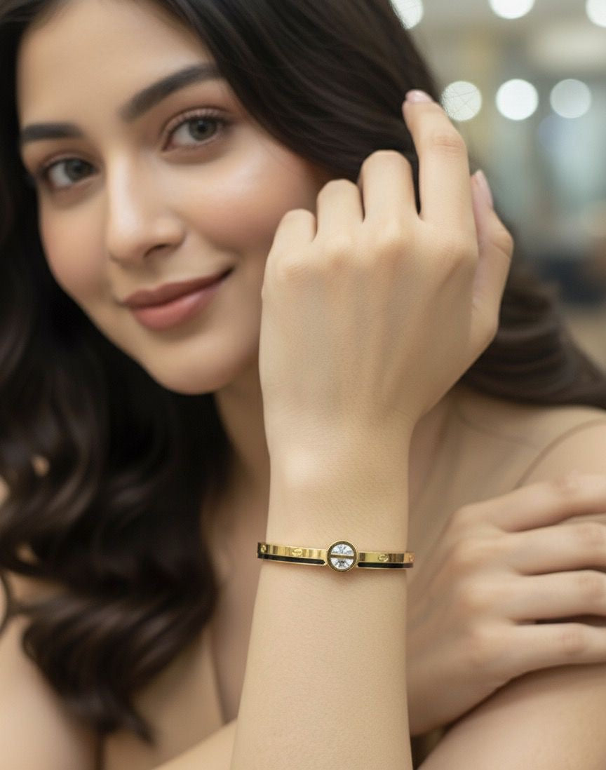 Gold Cartier Bangle with Crystal Accent