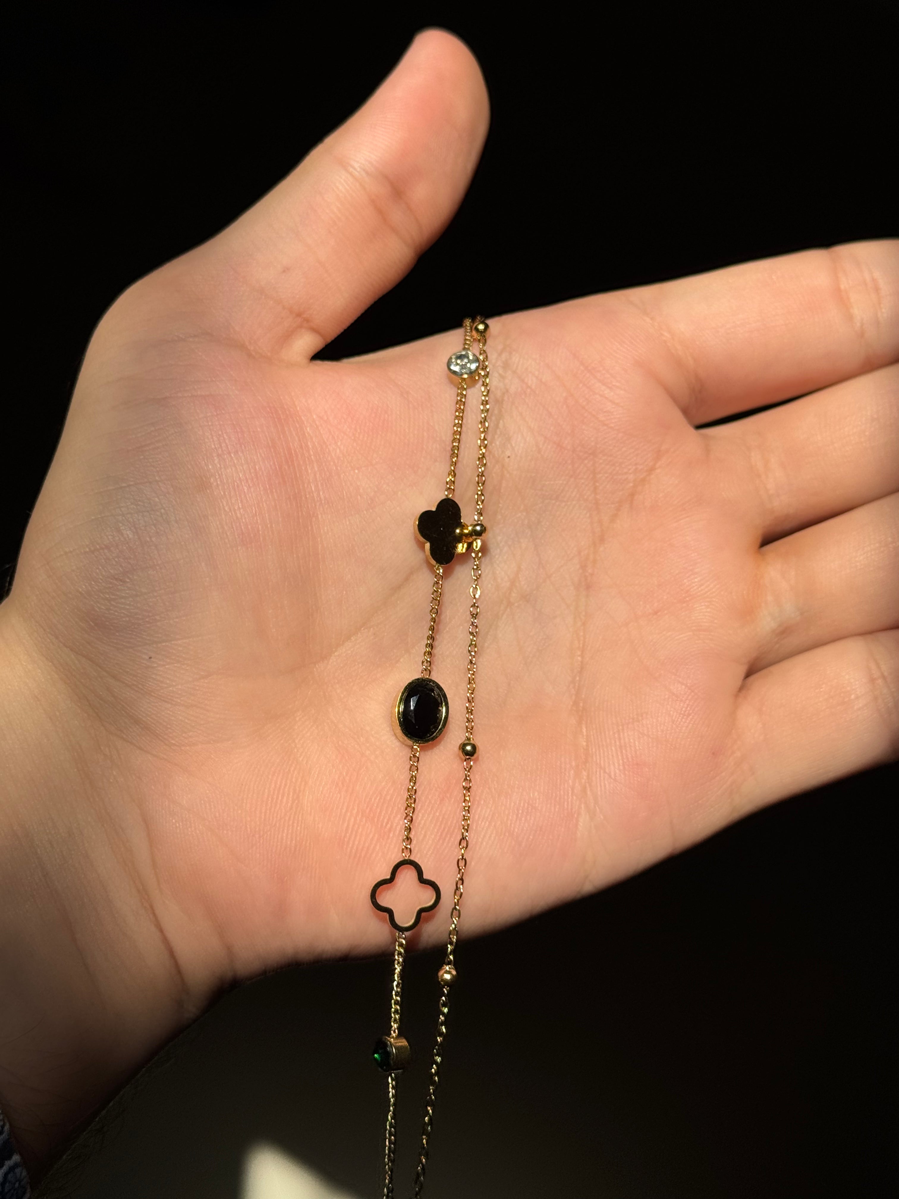 🌸 Elegant Clover & Black Stone Charm Bracelet –