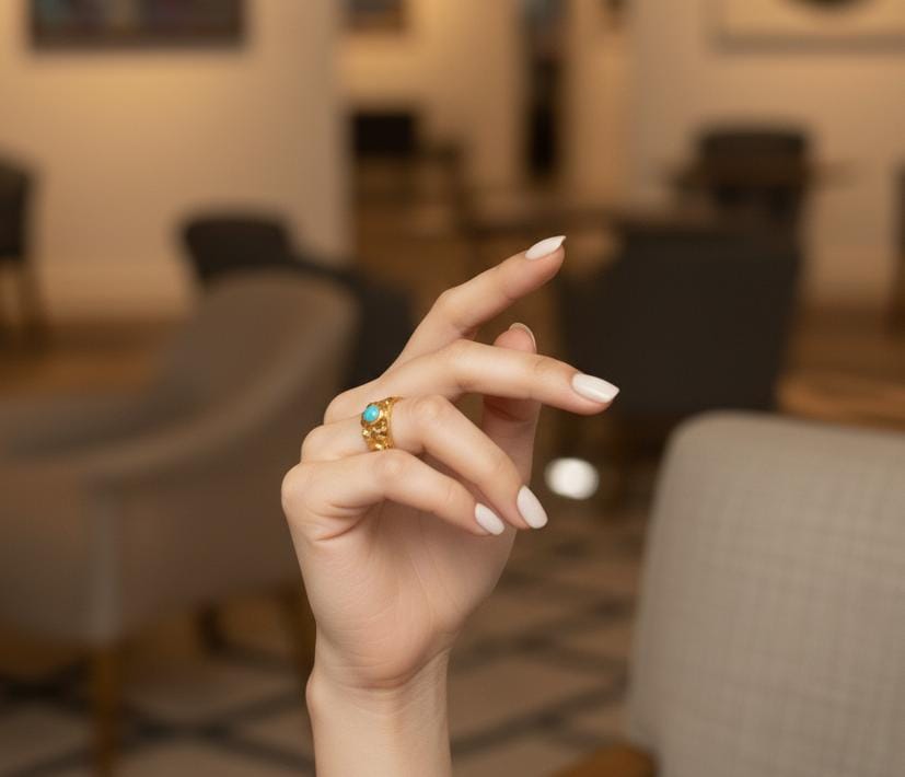 "Gold Ring with Ferozi Stone"