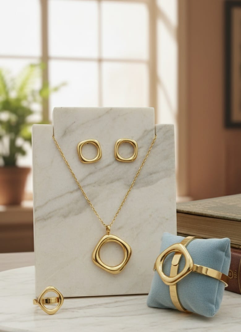 "Gold Jewelry Set with Interlocking Circles"
