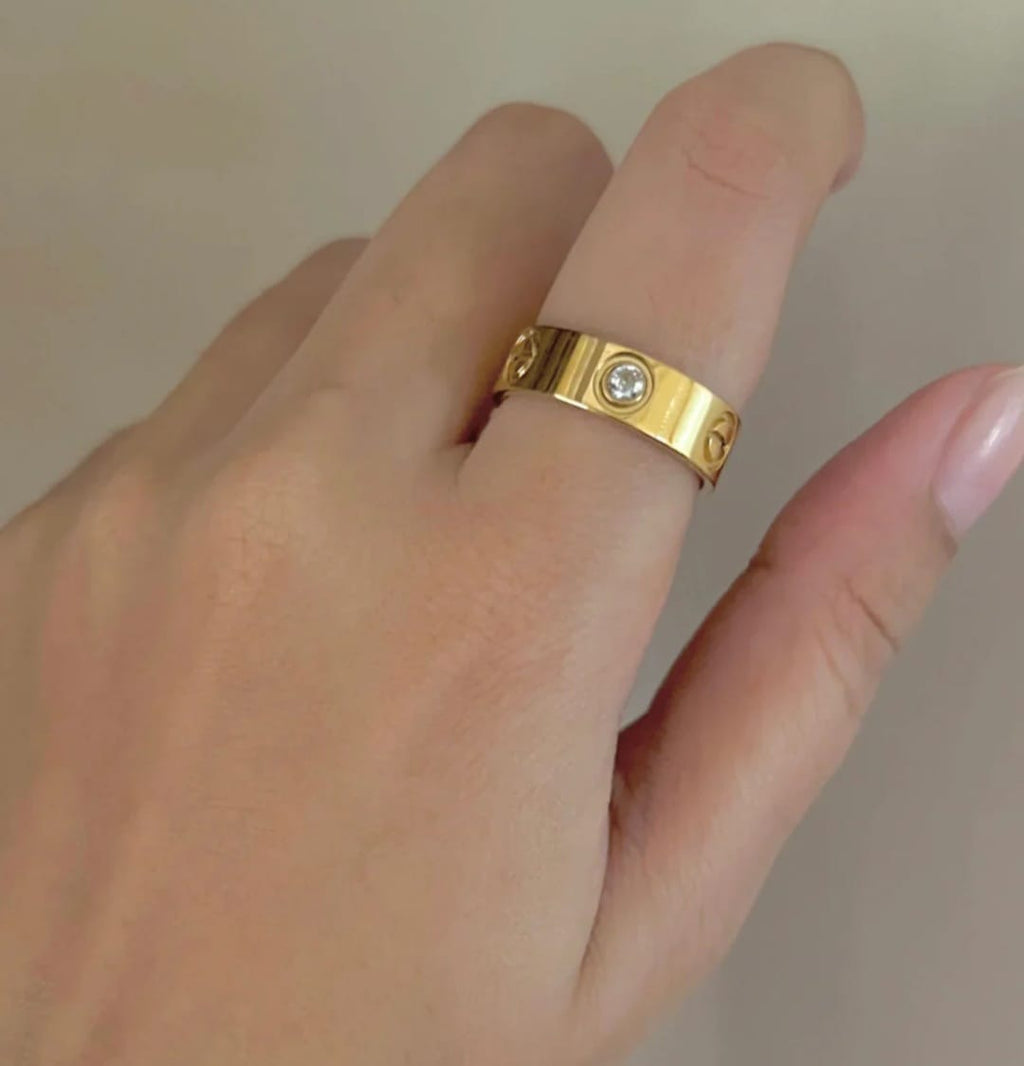 "Elegant Gold Cartier Ring with Diamond Accent 💎"