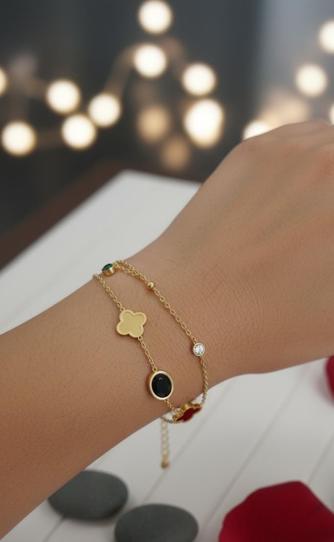 🌸 Elegant Clover & Black Stone Charm Bracelet –