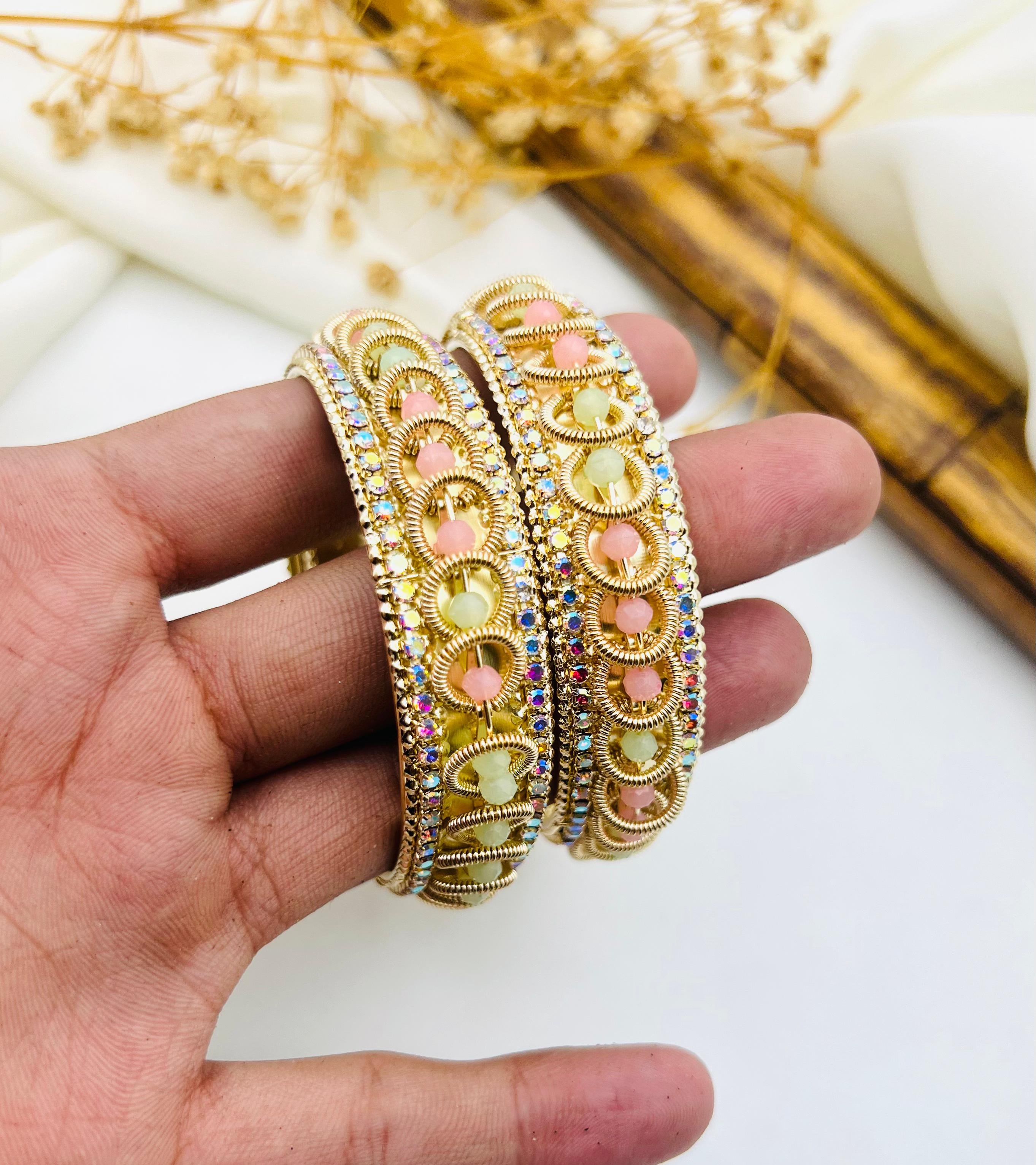 Elegant Gold Bangles with Pastel Stones